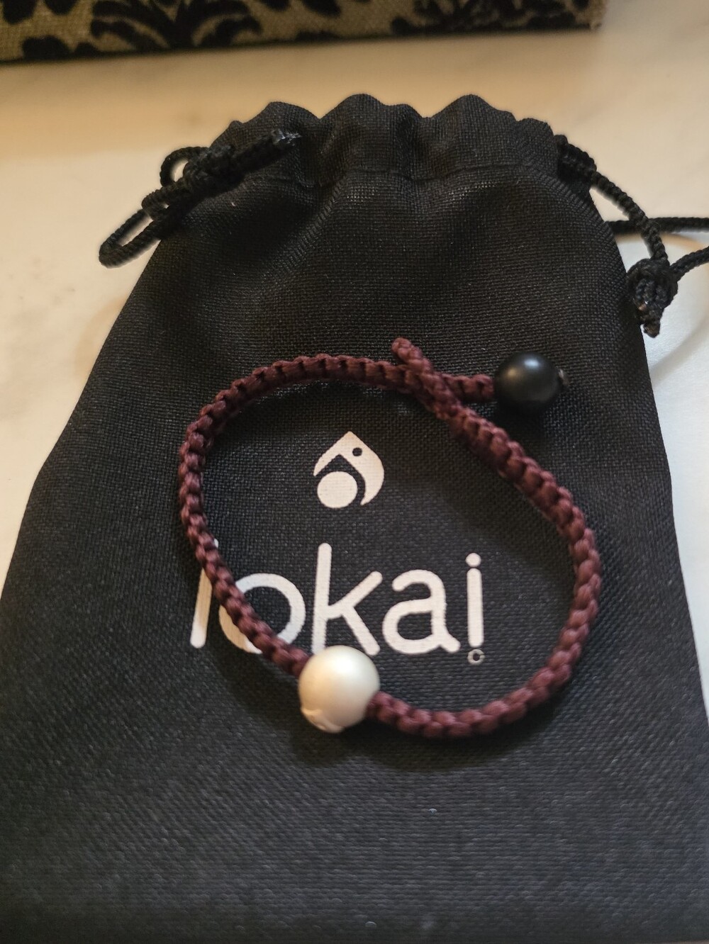 Lokai Braided Bracelet in Plum with Black and Pearl Beads